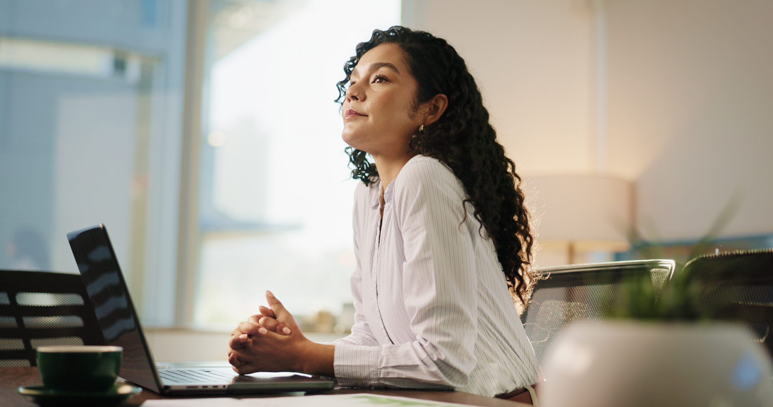 eDiscovery professional reviewing information at a legal office desk