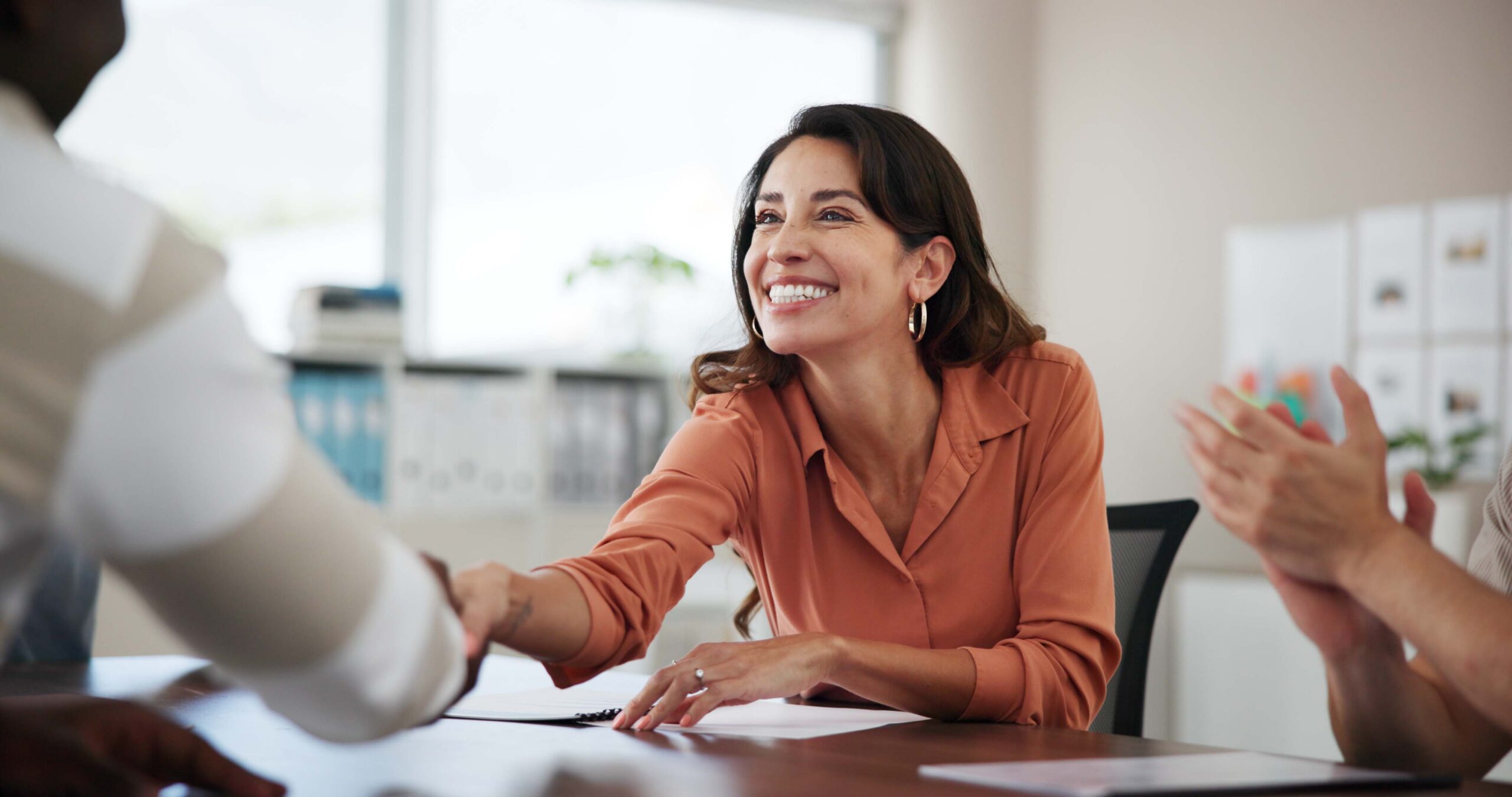 Legal recruiter and candidate celebrating a successful hire