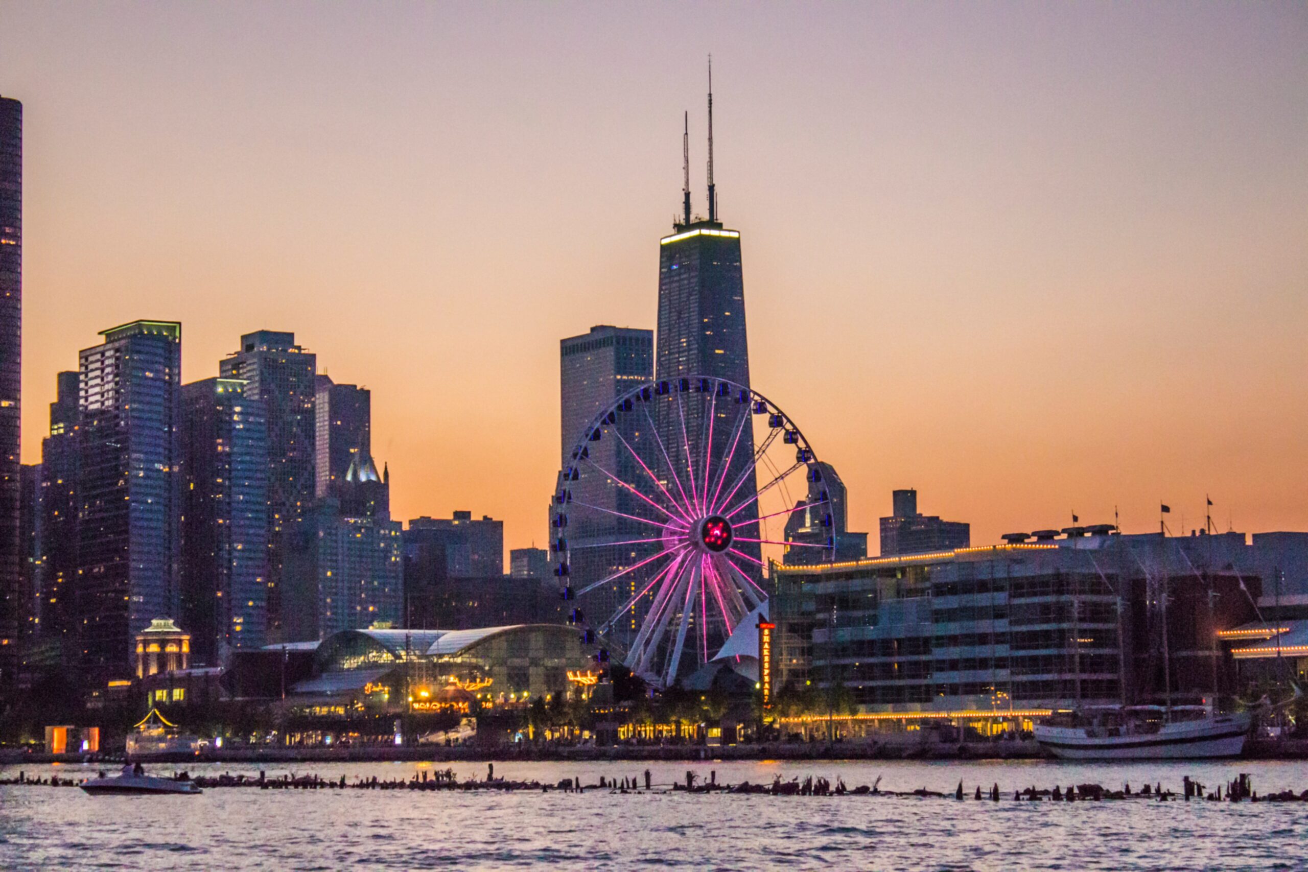Chicago skyline viewed across Lake Michigan at dusk