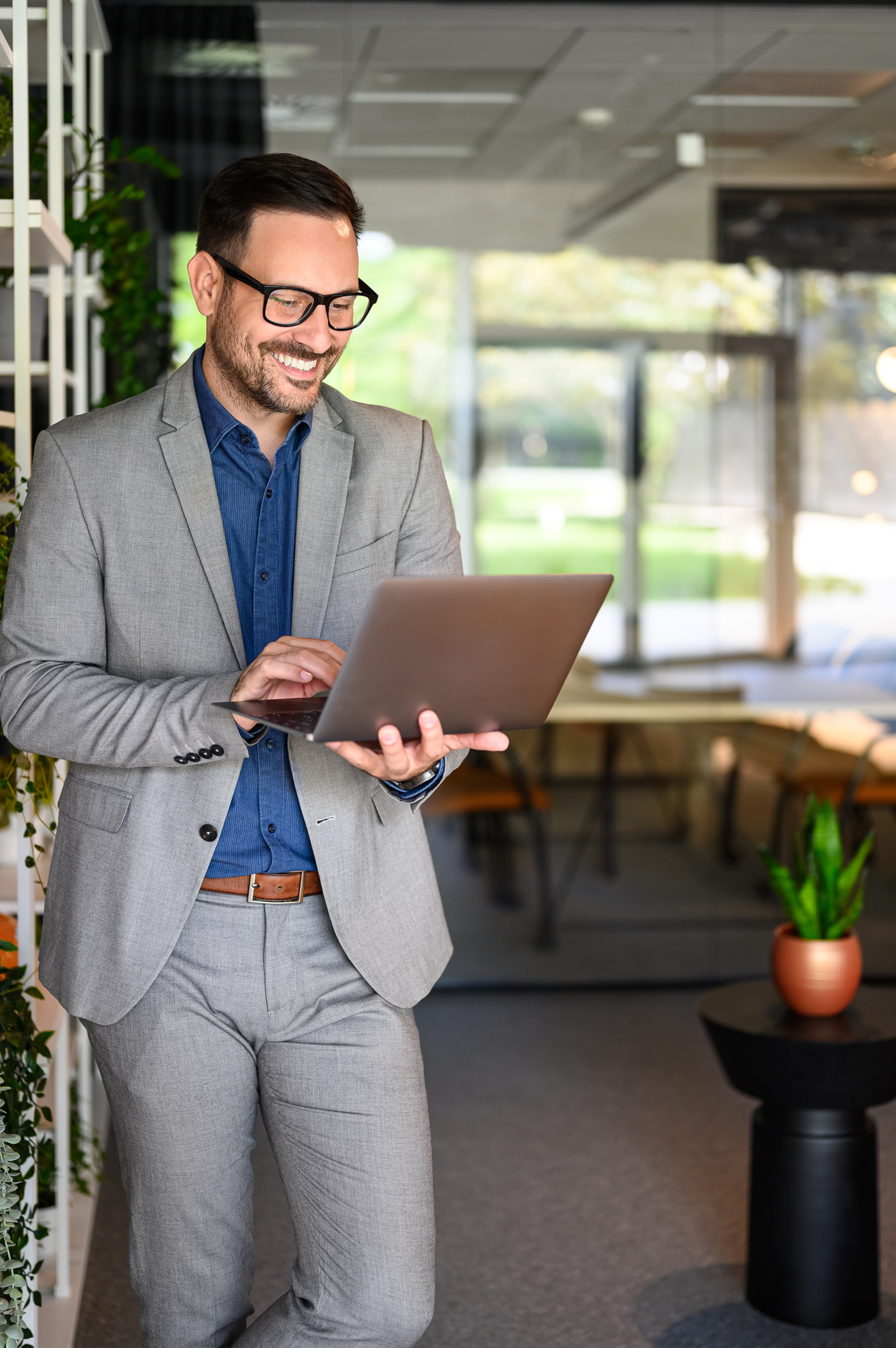 Legal recruiting professional reviewing candidate information on a laptop