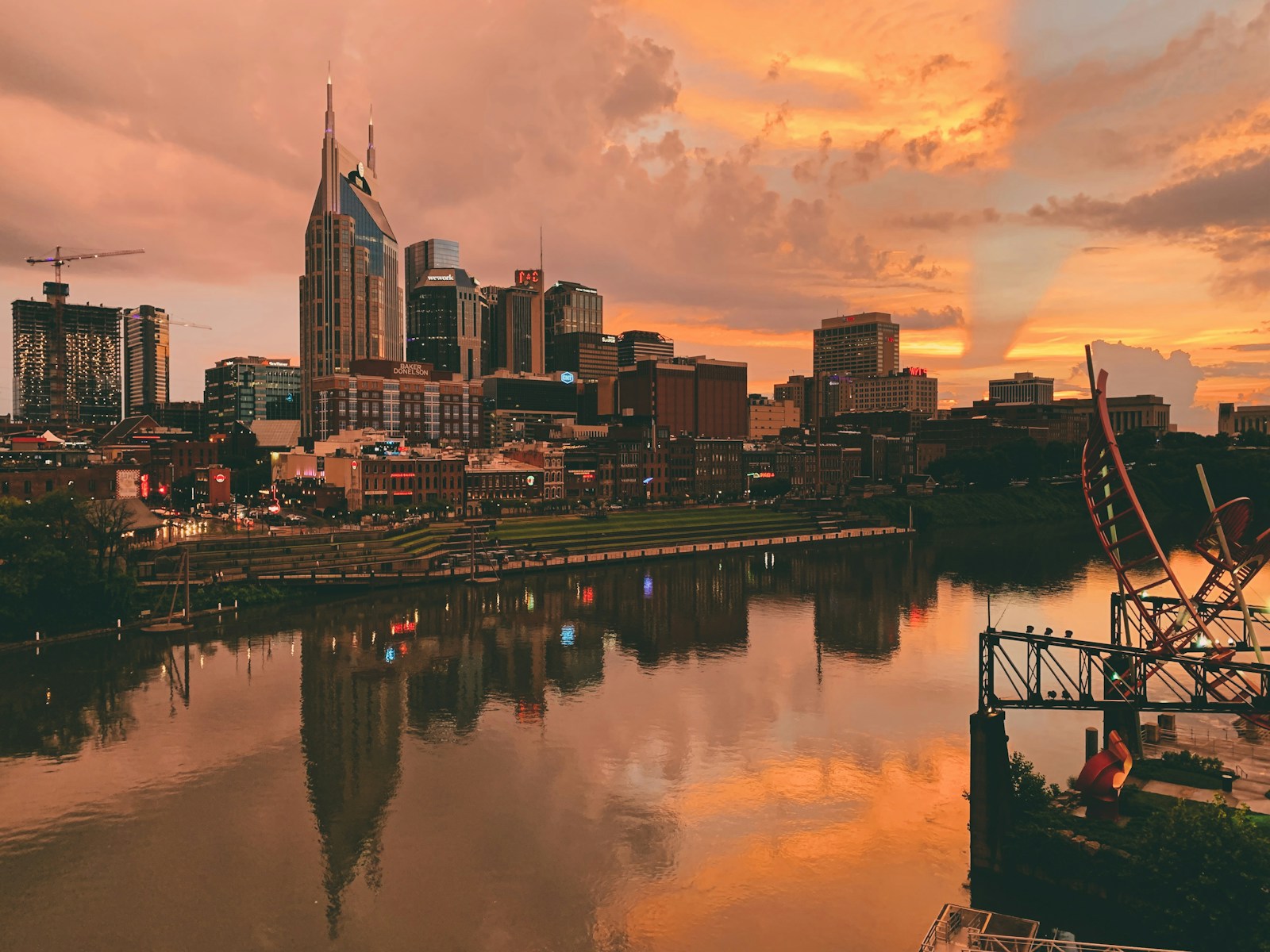 Nashville skyline beneath an orange Tennessee sunset