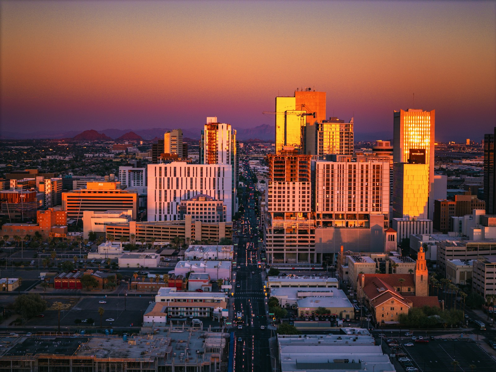 Downtown Phoenix skyline beneath the warm Arizona sky