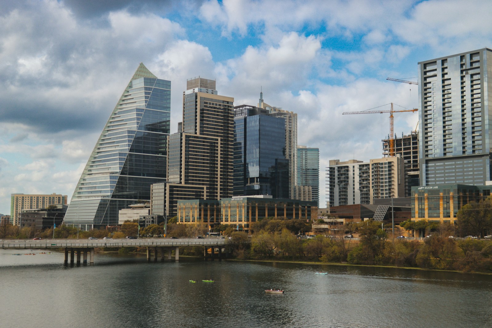 Downtown Austin skyline reflected across Lady Bird Lake