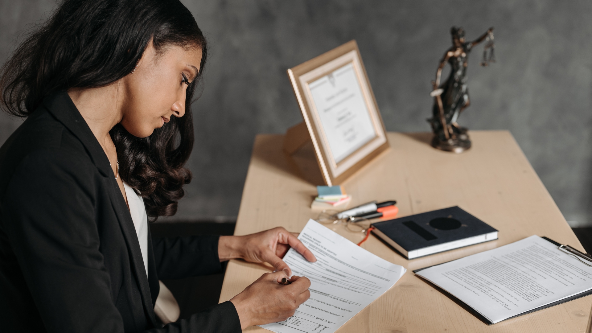 Legal professional reviewing documents in a Las Vegas law office