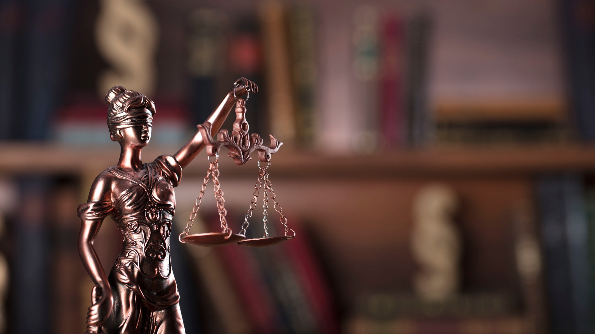 Lady Justice holding scales in a Philadelphia legal office
